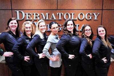The Dermatology of Virginia team standing together in the Fairfax office